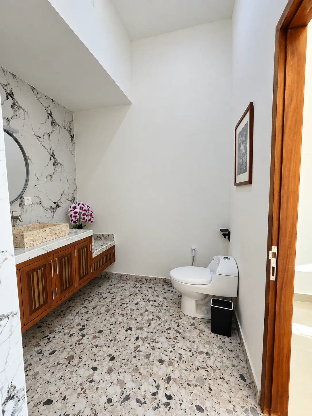 Private bathroom with marble accents